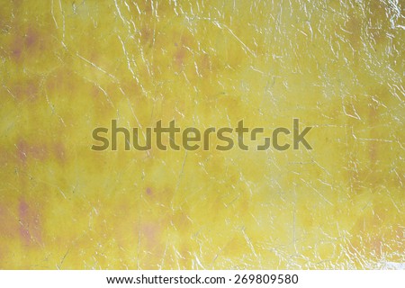 Golden green reflective texture/ Golden green plastic reflective abstract background texture / Golden green abstract background texture
