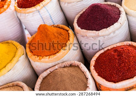 Red Spices in bags / Spices market bags / Red and orange spices