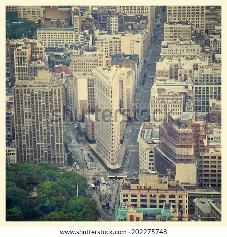 Aerial view of the streets of New York City including the Flatiron building with instagram style filter