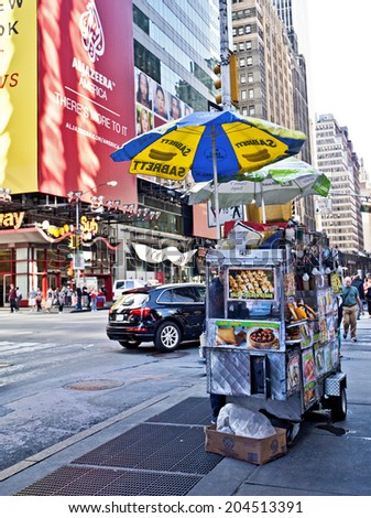 NEW YORK CITY - SEPTEMBER 22: Times Square street vendor in New York City, NY on September 22, 2013.