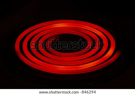 A glowing red stove top.