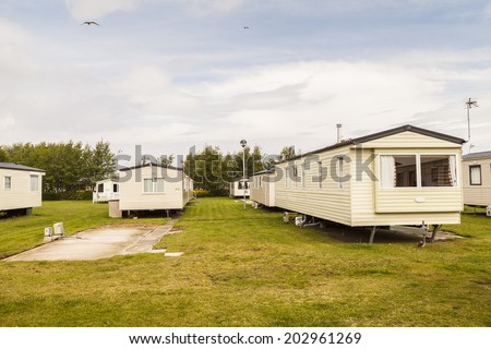 Static caravan holiday homes at a U. K. holiday resort.