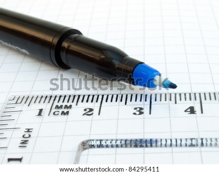 Ruler, pen and notebook on white background