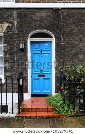 London, United Kingdom - typical colorful Victorian architecture door.