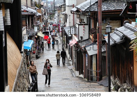 KYOTO, JAPAN - APRIL 14: Tourists walk on April 14, 2012 in Kyoto, Japan. Old Kyoto is a UNESCO World Heritage site and was visited by almost 1 million foreign tourists in 2010.