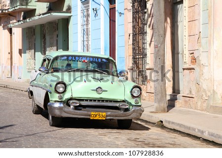 CAMAGUEY, CUBA - FEBRUARY 17: Classic American car on February 17, 2011 in Camaguey, Cuba. Recent law change allows the Cubans to trade cars again. Old law resulted in very old cars in Cuba.