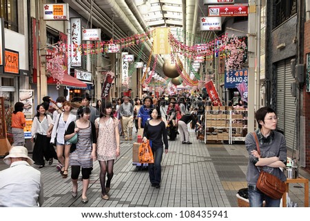 NAGOYA, JAPAN - APRIL 28: Shoppers walk along Osu Kannon covered shopping street on April 28, 2012 in Nagoya, Japan. Tripadvisor says it is currently among top 10 places worth visiting in Nagoya.