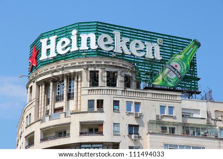 BUCHAREST, ROMANIA - AUGUST 19: Heineken ad on August 19, 2012 on a building in Bucharest, Romania. With 139.2 million hectolitres of beer annually, Heineken is the 3rd largest beer producer worldwide
