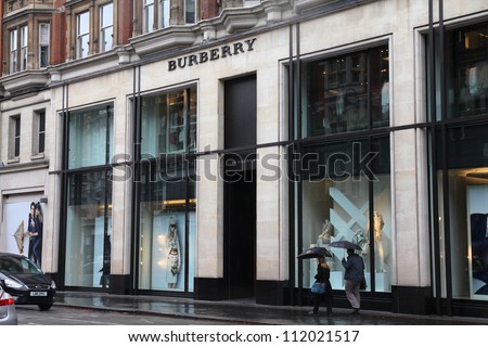 LONDON - MAY 14: Shoppers visit Burberry store on May 14, 2012 in London. Burberry exists since 1856 and has 473 stores. Business Weekly claims Burberry is the 98th most valuable brand worldwide.