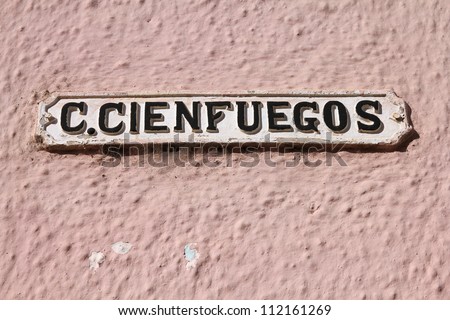 Remedios, Cuba - vintage street sign at Camilo Cienfuegos street. Camilo Cienfuegos was a famous Cuban hero.