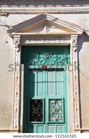 Remedios in Cuba - typical old town colonial architecture. Wooden door.