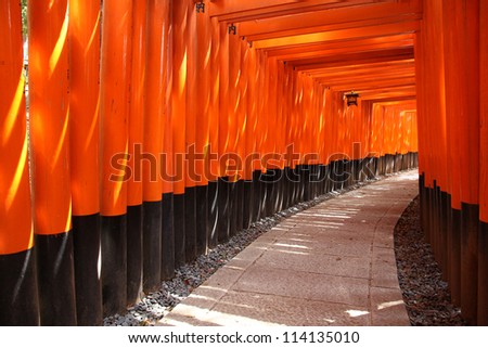 Fushimi Inari Taisha shrine in Kyoto prefecture of Japan. Famous shinto shrine with thousands of vermilion torii gates.