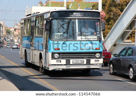 SZEGED, HUNGARY - AUGUST 13: People ride city bus on August 13, 2012 in Szeged, Hungary. As of 2011 Szeged Buses operated 33 lines and used fleet of 126 vehicles.