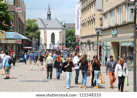 ESSEN, GERMANY - JULY 17: People shop downtown on July 17, 2012 in Essen, Germany. Essen is a city of almost 600 thousand citizens and was the 2010 European Capital of Culture.