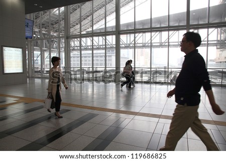 OSAKA, JAPAN - APRIL 25: People hurry at Osaka Station on April 25, 2012 in Osaka, Japan. It is the 3rd busiest station in the world serving average 2.4 million passengers daily.
