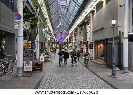 OKAYAMA, JAPAN - APRIL 22: Visitors shop at Omotecho covered street on April 22, 2012 in Okayama, Japan. Omotecho is the most popular shopping destination in Okayama.