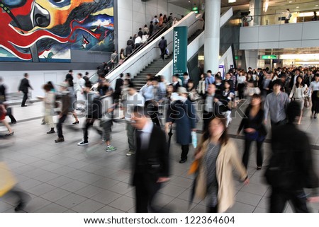 TOKYO - MAY 9: Commuters hurry at Tokyo Shibuya station on May 9, 2012 in Tokyo. With 2.4 million passengers on a weekday, it is the 4th-busiest commuter rail station in Japan.