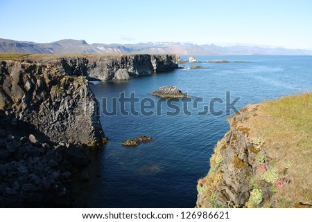 Iceland coast in Arnarstapi, Snafellsnes peninsula. Faxafloi bay.