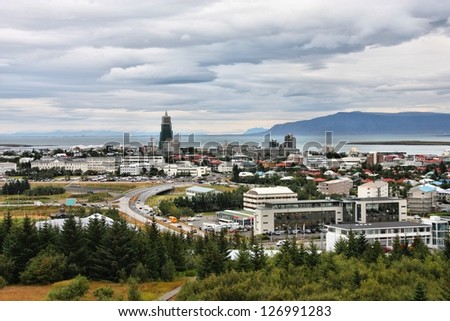 Architecture in Reykjavik, Iceland. Aerial view from Perlan. Cloudy day.