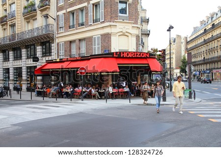 PARIS - JULY 24: Tourists eat at L\'Horizon restaurant on July 24, 2011 in Paris, France. Paris is the most visited city in the world with 15.6 million international arrivals in 2011.
