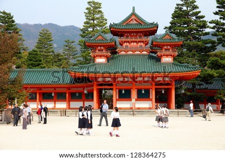 KYOTO, JAPAN - APRIL 19: Tourists visit Heian Jingu shrine on April 19, 2012 in Kyoto, Japan. Old Kyoto is a UNESCO World Heritage site and was visited by almost 1 million foreign tourists in 2010.