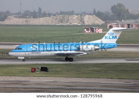 BOLOGNA, ITALY - OCTOBER 16: Fokker 70 of KLM on October 16, 2010 at Bologna International Airport, Italy. The aircraft model is going to be relaunched by Rekkof Aircraft as XF70NG.