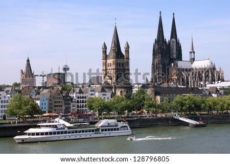 Cologne, Germany - Cityscape With Rhine River And Famous Cathedral. Photo May Seem Tilted To The Left - Optical Illusion.