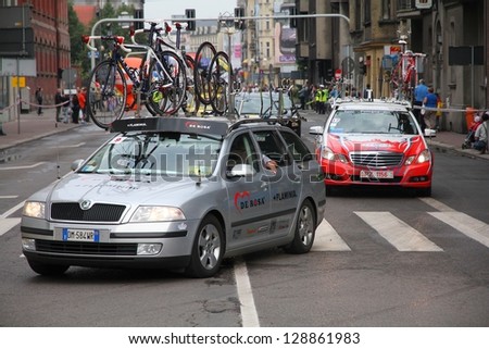 KATOWICE, POLAND - AUGUST 2: Team car on the route of Tour de Pologne bicycle race on August 2, 2011 in Katowice, Poland. TdP is part of UCI World Tour. Skoda Superb of De Rosa Ceramica Flaminia team.