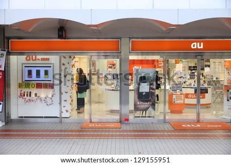 OSAKA, JAPAN - APRIL 24: Customers visit AU by KDDI mobile phone company on April 24, 2012 in Osaka, Japan. KDDI Corporation employs more than 18 thousand people. It exists since 1984.