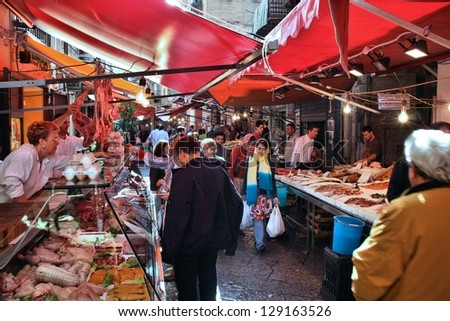 PALERMO, ITALY - OCTOBER 25: People shop at local market on October 25, 2009 in Palermo, Italy. Palermo is the 5th most populated area in Italy and the most populated on the island of Sicily.