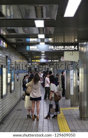 NAGOYA, JAPAN - APRIL 28: Commuters wait for Nagoya Subway on April 28, 2012 in Nagoya, Japan. Nagoya Subway is among top 30 busiest metro systems worldwide with 427 million annual rides.