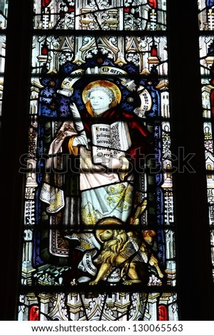 WOLVERHAMPTON, UK - MARCH 10: Stained glass Saint Mark in St Peter\'s Collegiate Church on March 10, 2010 in Wolverhampton, UK. The famous church dates back to 12th century.