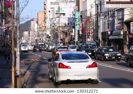 KYOTO, JAPAN - APRIL 14: Cars drive in heavy traffic on April 14, 2012 in Kyoto, Japan. With 589 vehicles per capita, Japan is among most motorized countries worldwide, which causes heavy traffic.