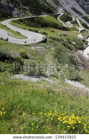 Italy, Stelvio National Park. Famous road to Stelvio Pass in Ortler Alps. Alpine landscape.
