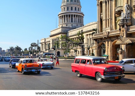 HAVANA - FEBRUARY 27: Cubans drive classic cars on February 27, 2011 in Havana. Recent change in law allows the Cubans to trade cars again. Most cars in Cuba are very old because of the old law.
