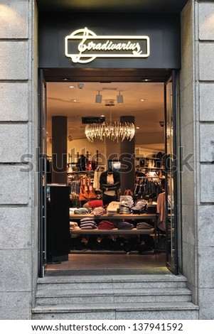 MADRID - OCTOBER 24: People shop at Stradivarius store on October 24, 2012 in Madrid. Stradivarius brand is part of Inditex. It operates 780 stores in 53 countries.