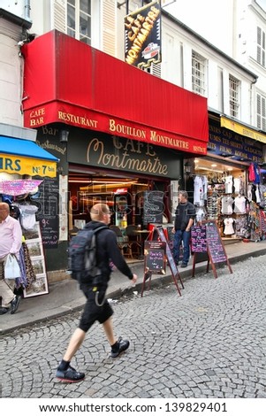 PARIS - JULY 22: Tourists visit Rue de Steinkerque on July 22, 2011 in Paris, France. The street is one of most famous shopping areas in Monmartre district. Paris is the most visited city worldwide.