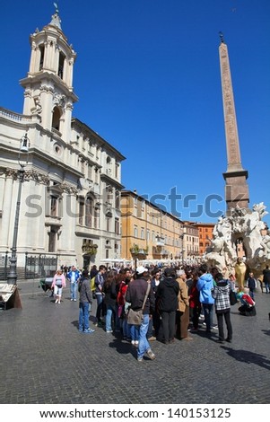 ROME - APRIL 10: Tourists visit Piazza Navona on April 10, 2012 in Rome. According to Euromonitor, Rome is the 3rd most visited city in Europe (5.5m international tourist arrivals 2009)