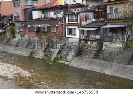 Takayama, Japan - town in Gifu prefeture of the region Chubu. Old houses by the river.