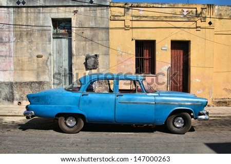 MATANZAS, CUBA - FEBRUARY 22: Old American car on February 22, 2011 in Matanzas, Cuba. New change in law allows Cubans to trade cars. Cars in Cuba are very old because of the old law.