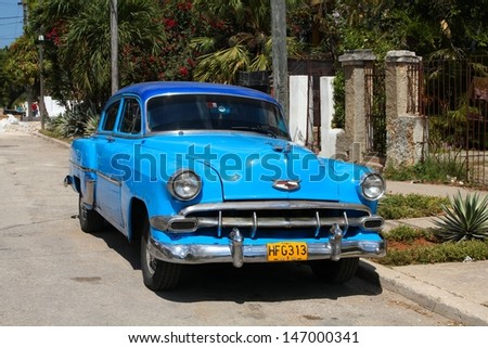 HAVANA - FEBRUARY 24: Classic American car on February 24, 2011 in Havana. Recent change in law allows the Cubans to trade cars again. Old law resulted in very old fleet of private owned cars in Cuba.