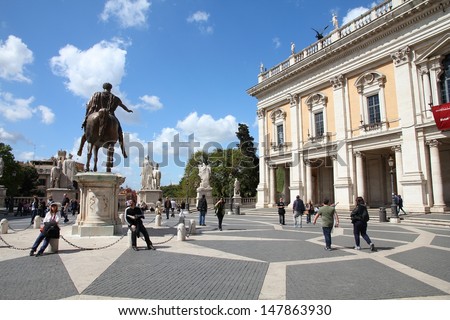ROME - APRIL 8: Tourists visit Capitoline Hill on April 8, 2012 in Rome. According to Euromonitor, Rome is the 3rd most visited city in Europe (5.5m international tourist arrivals 2009)
