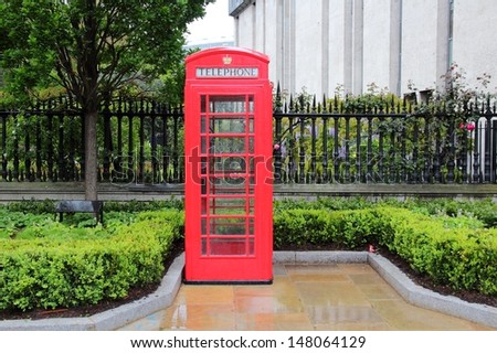 London, United Kingdom - red telephone box in the rain