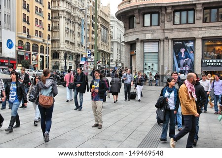 MADRID OCTOBER 24 People shop downtown on October 24 2012 in Madrid Madrid is a popular tourism destinations with 3.9 million estimated annual visitors official data MADRID OCTOBER 24 People shop downtown on October 24 2012 in Madrid Madrid is a popular tourism destinations with 3.9 million estimated annual visitors official data