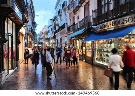 Seville, Spain - November 3: People Visit Shopping Area On November 3, 2012 In Seville, Spain. Seville Is The 4th Largest City In Spain And The Largest In Region Of Andalusia.