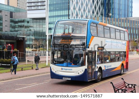 MANCHESTER, UK - APRIL 22: People ride Stagecoach city bus on April 22, 2013 in Manchester, UK. Stagecoach Group has 16% bus market in the UK. Stagecoach UK employs 18,000 people.