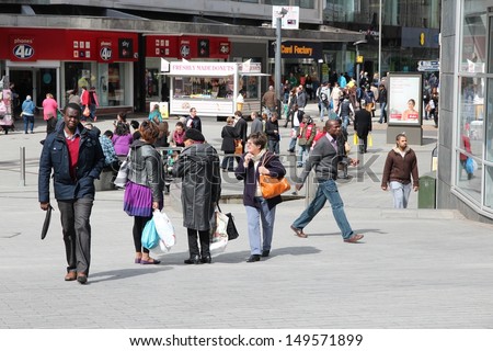 BIRMINGHAM, UK - APRIL 19: People shop downtown on April 19, 2013 in Birmingham, UK. Birmingham is the most populous British city outside London with 1.07 million residents.