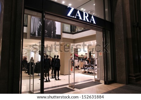 Barcelona, Spain - November 5: People Visit Zara Store On November 5, 2012 In Barcelona, Spain. Zara Has 1,763 Stores And Had More Than 7 Billion Eur Revenue In 2009.