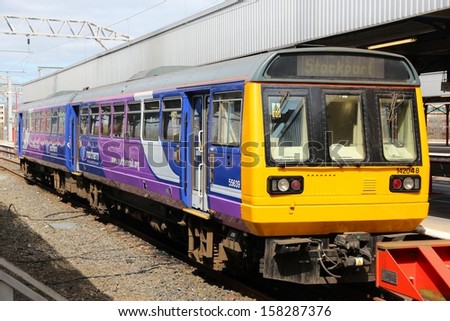 STOCKPORT, UK - APRIL 23: Northern Rail train on April 23, 2013 in Stockport, UK. NR is part of Serco-Abellio joint venture. NR has fleet of 313 trains and calls at 529 stations.