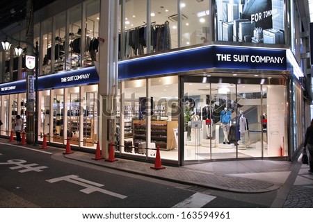 OSAKA, JAPAN - APRIL 24: People shop at Suit Company store on April 24, 2012 in Osaka, Japan. SC one of largest retailers of business apparel in Japan and has 40 brand stores in largest cities.